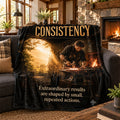 Consistency motivational quote sherpa blanket draped over a sofa