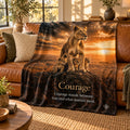 Courage motivational quote blanket draped over a sofa