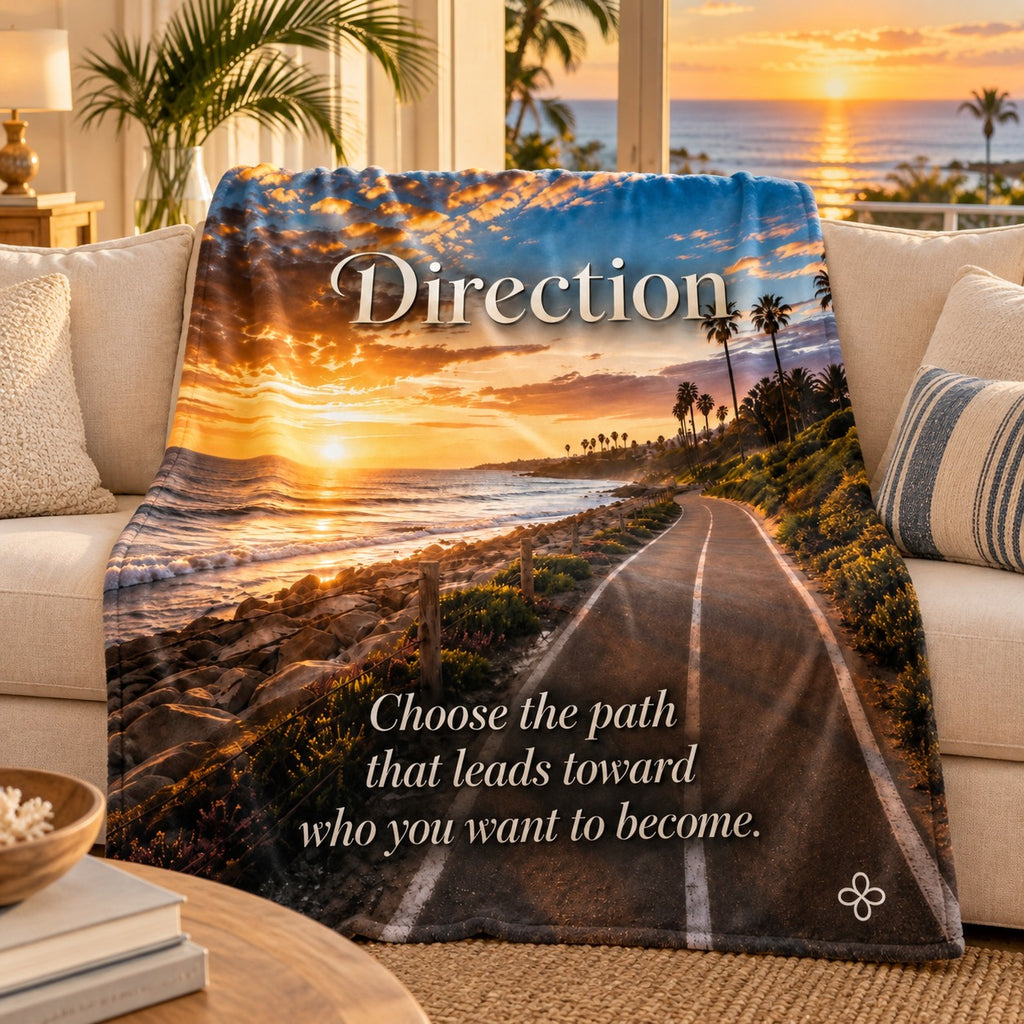 Direction motivational quote blanket draped over a sofa