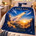 Dream motivational quote sherpa blanket draped over a sofa