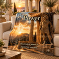 Power motivational quote blanket draped over a sofa