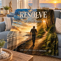 Resolve motivational quote blanket draped over a sofa