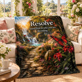 Resolve motivational quote sherpa blanket draped over a sofa