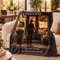 Success motivational quote blanket draped over a sofa