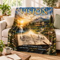 Vision motivational quote blanket draped over a sofa in a cozy living room
