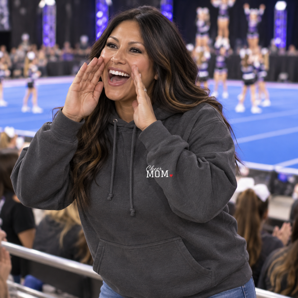 Cheer mom wearing the personalized jersey hoodie