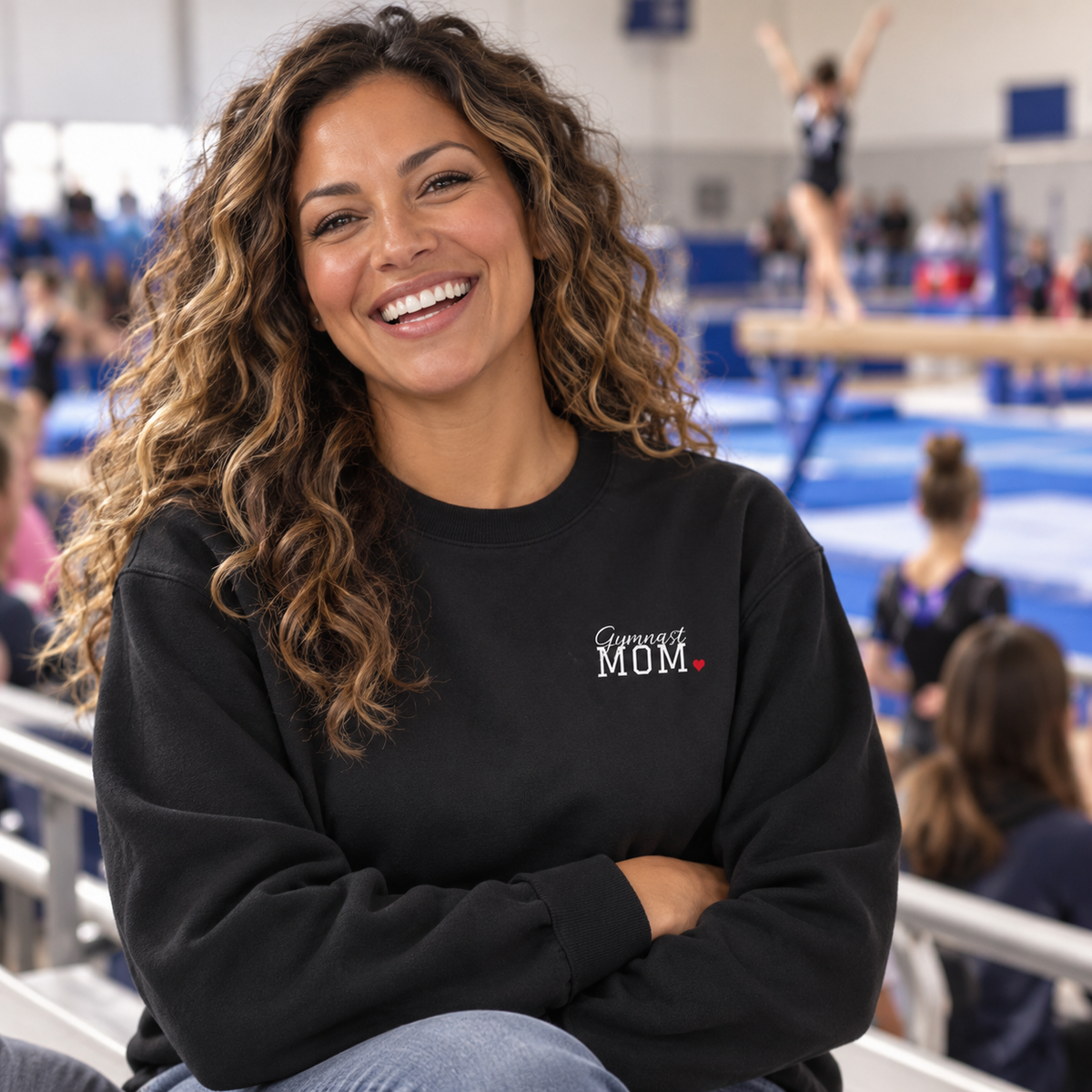 Gymnastics mom wearing the personalized jersey sweatshirt