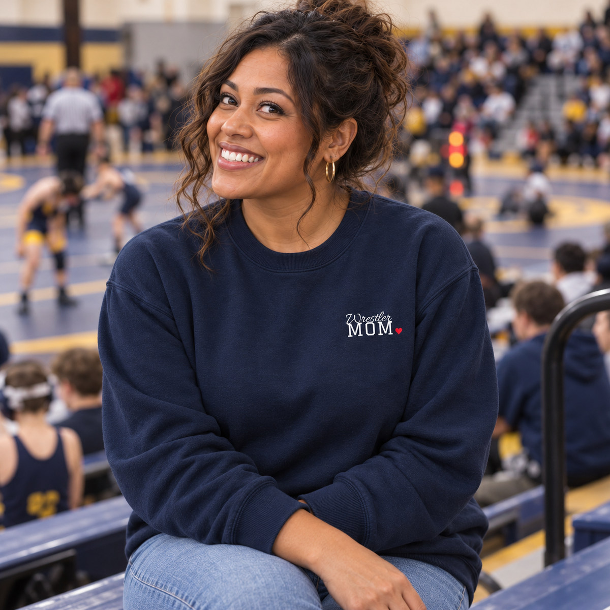 Wrestling mom wearing the personalized jersey sweatshirt