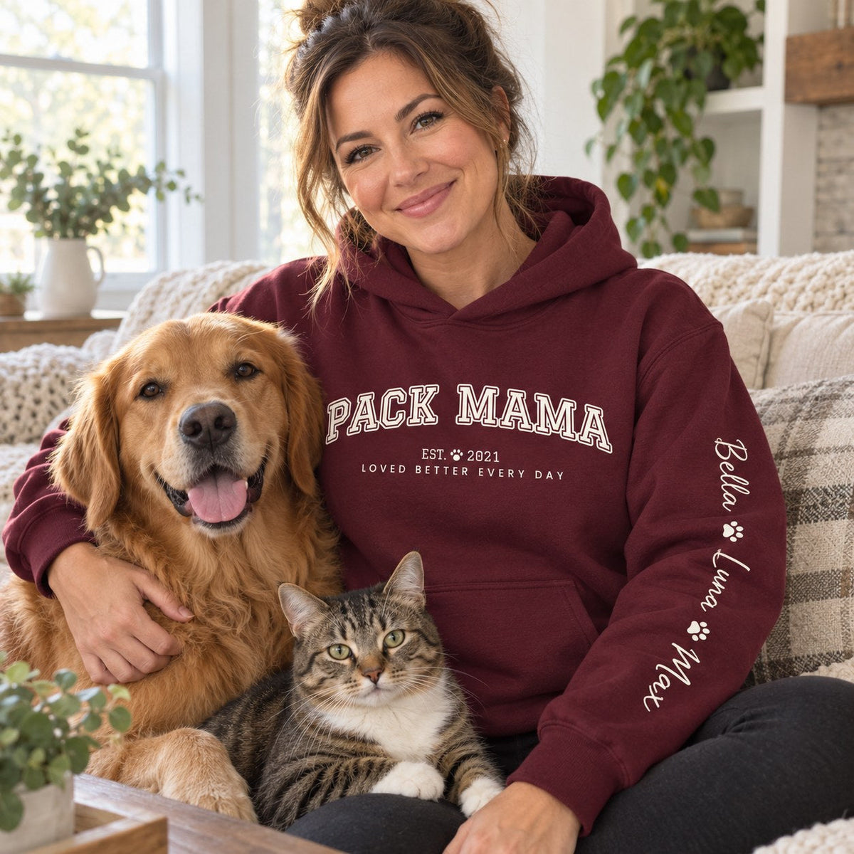 Personalized Pack Mama Hoodie - lifestyle photo with pet names on the sleeve